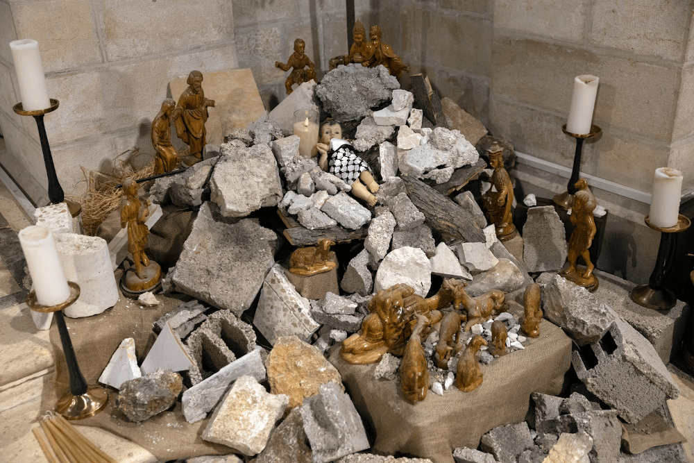 Photo of nativity scene set in war rubble, Jerusalem church, Christmas 2023